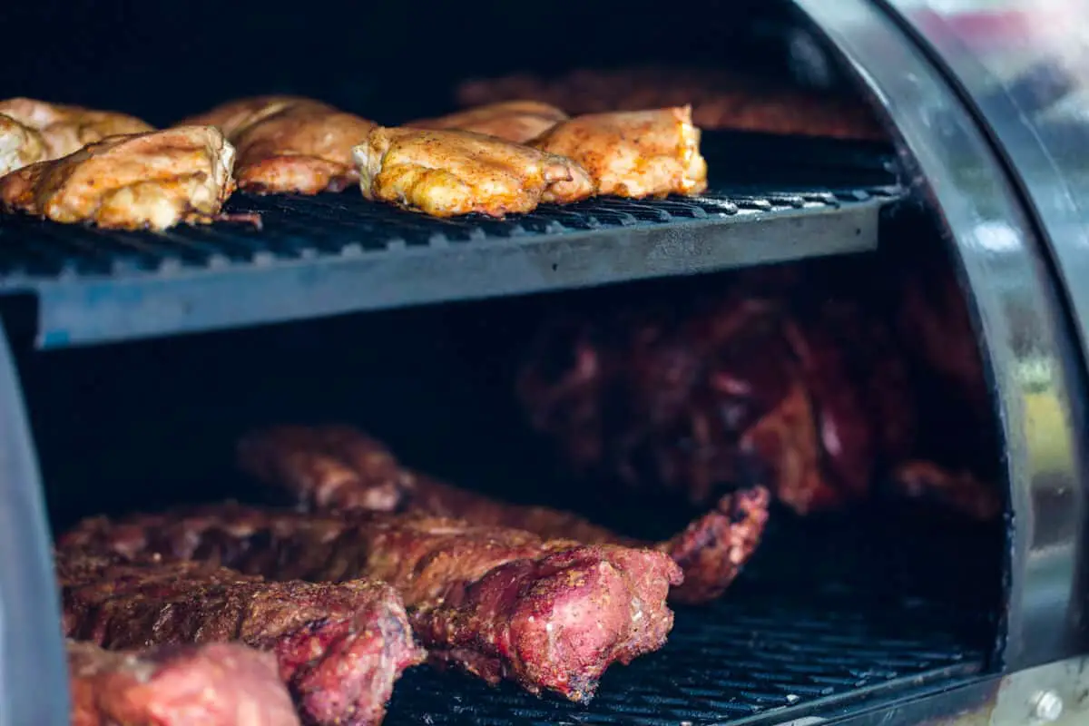 Meat prepared in outdoor smokers for competition showing  one of the best outdoor smokers.