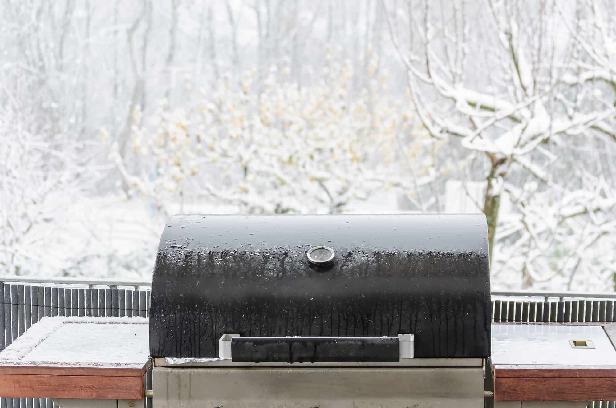 BBQ on the outside balcony in the winter snowstorm.