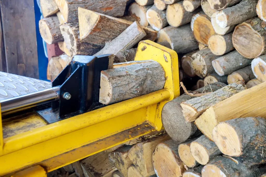 Close up of a log splitter showing the need for hydraulic fluid in a log splitter.