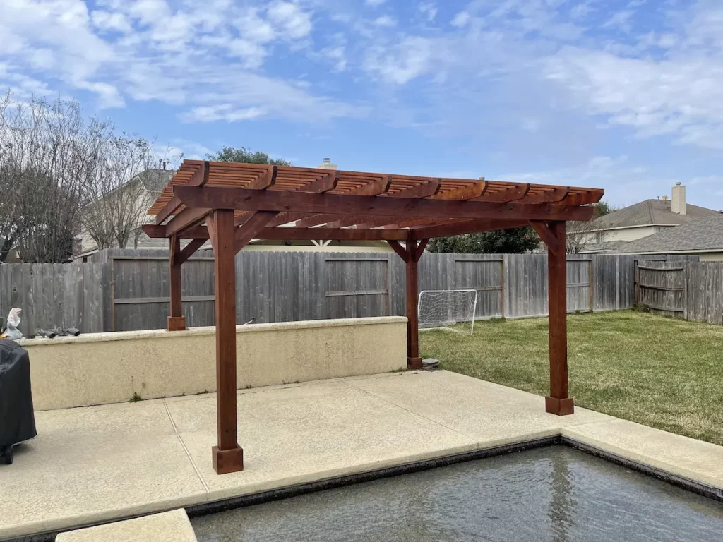 A pergola in backyard next to pool.  Was it better to use Douglas Fir or Cedar for a pergola?