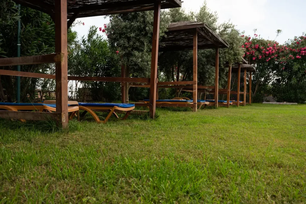 Row of tall gazebos at a retreat field